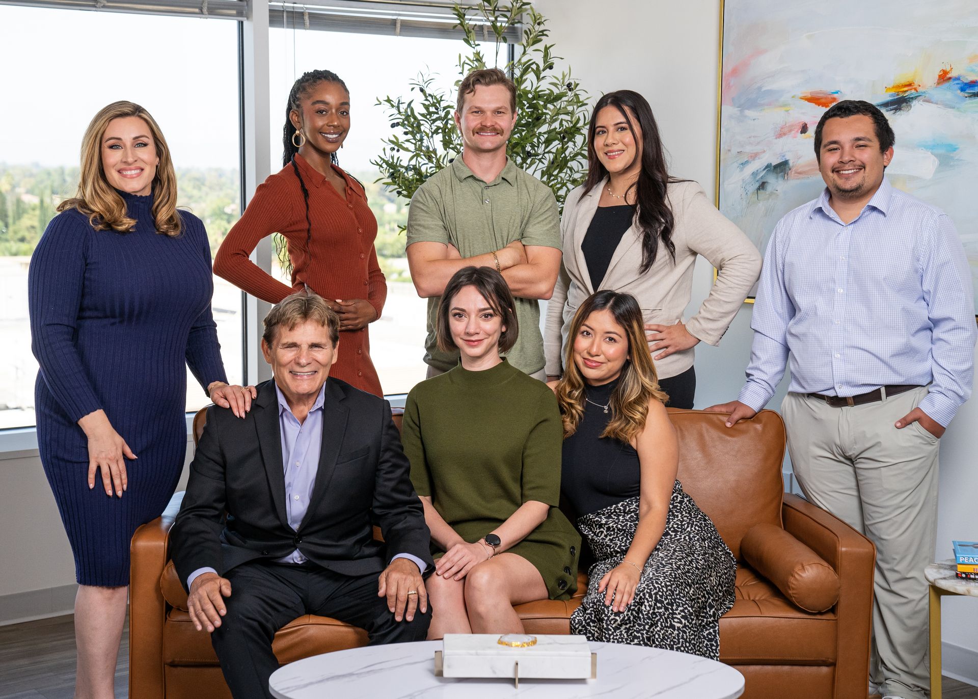 The Addition Building and Design team in the studio, Mike and Christine Ross at the center